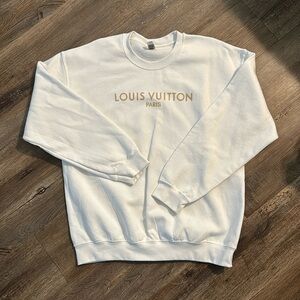 Graphic sweatshirt (not designer brand).